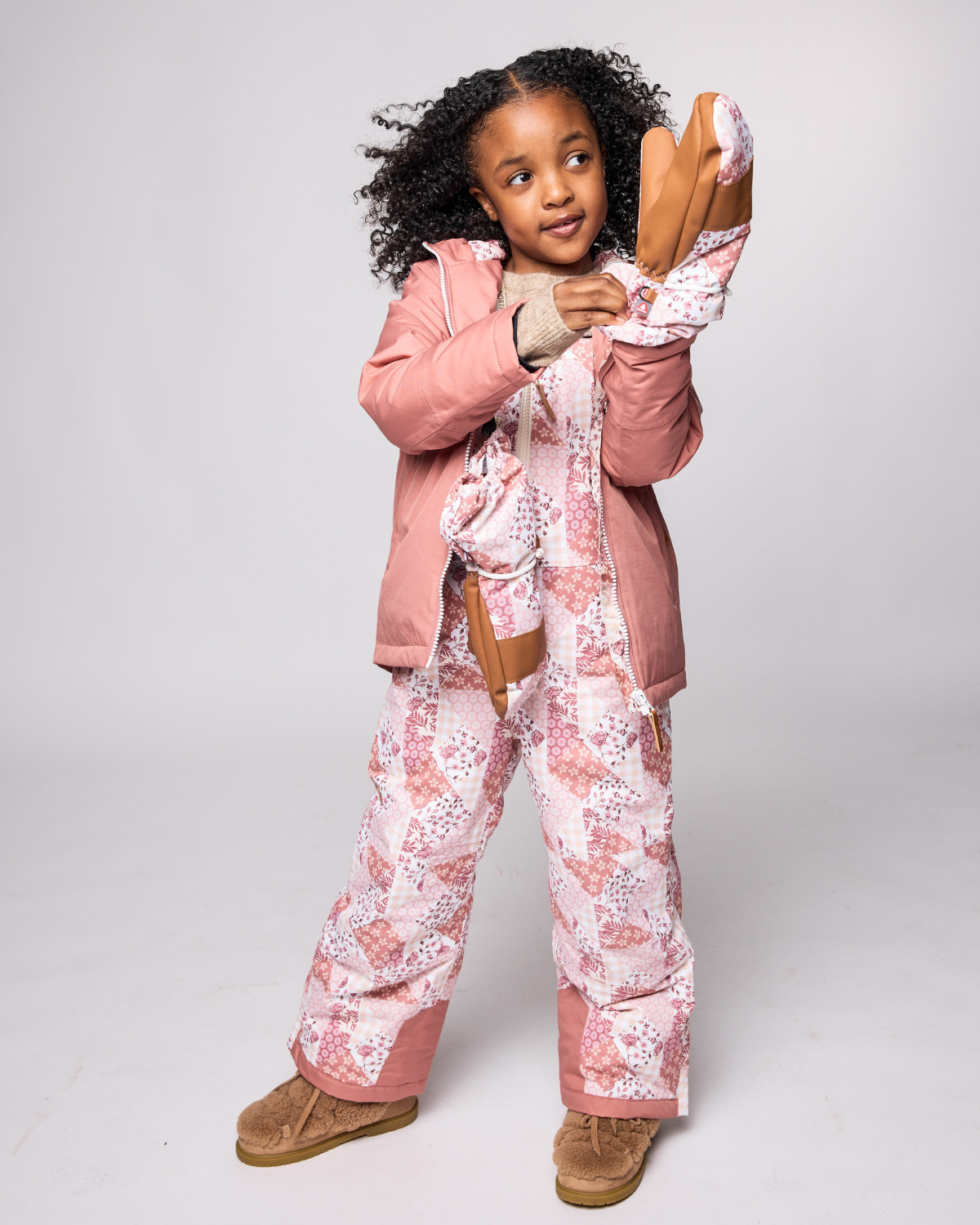 Kids pink patchwork mittens for boys and girls, featuring warm insulation, soft fleece lining, and waterproof exterior, designed for skiing and winter snow sports to keep hands warm in cold weather