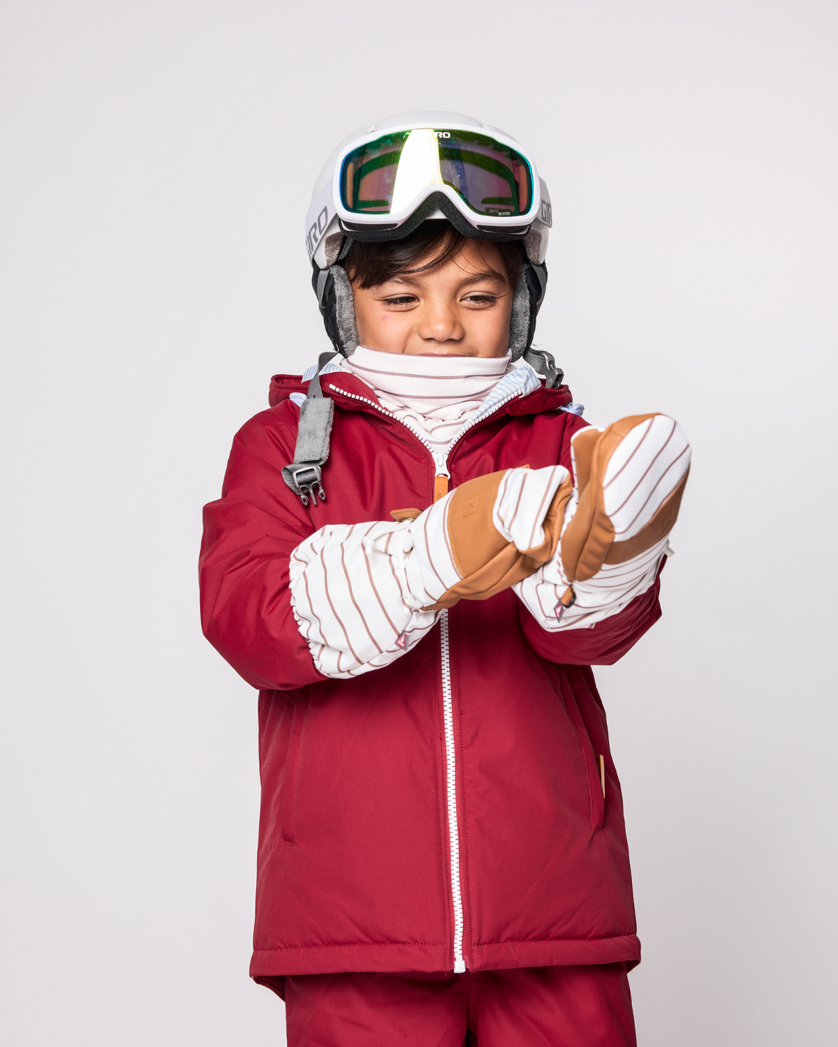 Kids brown and white striped mittens for boys and girls, featuring warm insulation, soft fleece lining, and waterproof exterior, designed for skiing and winter snow sports to keep hands warm in cold weather