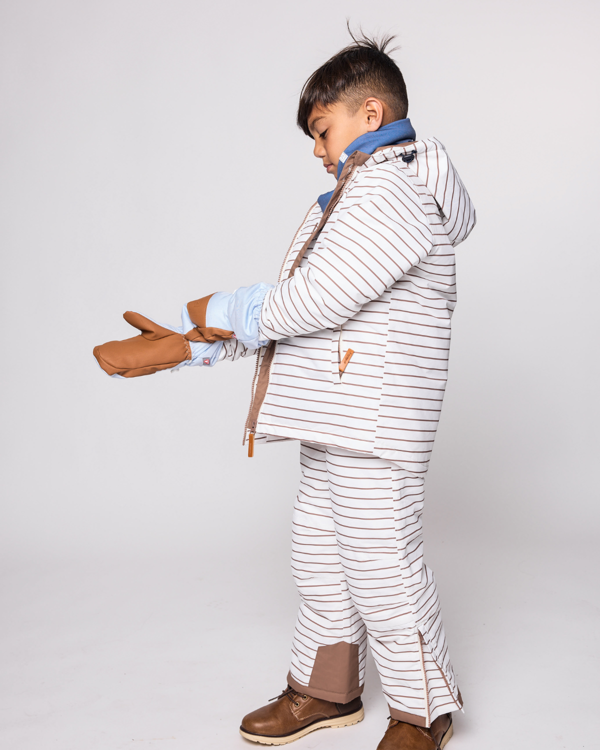 Kids light blue mittens for boys and girls, featuring warm insulation, soft fleece lining, and waterproof exterior, designed for skiing and winter snow sports to keep hands warm in cold weather