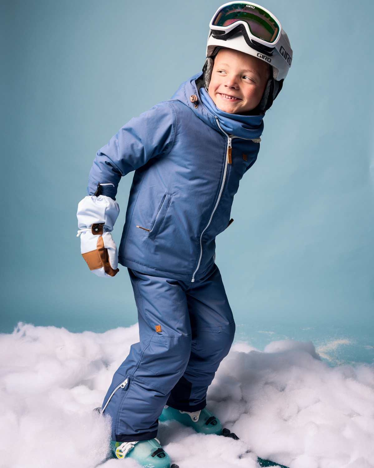 Kids light blue mittens for boys and girls, featuring warm insulation, soft fleece lining, and waterproof exterior, designed for skiing and winter snow sports to keep hands warm in cold weather