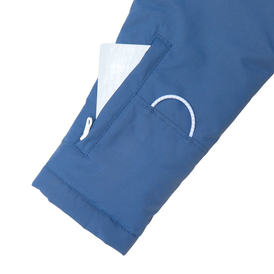 Kids blue winter coat for skiing and snow play, with warm insulation and waterproof outer shell for full cold weather protection and hood