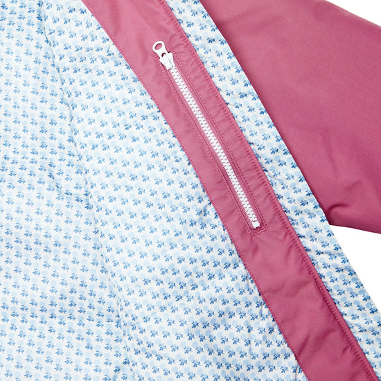 Girls pink winter coat for skiing and snow play, with warm insulation and waterproof outer shell for full cold weather protection and hood