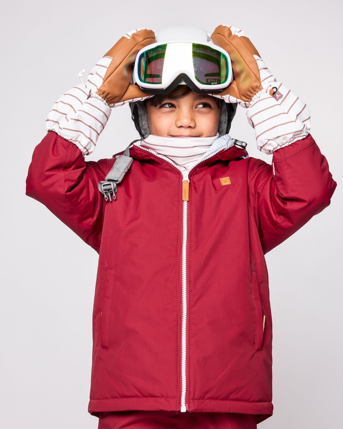 Kids brown and white striped mittens for boys and girls, featuring warm insulation, soft fleece lining, and waterproof exterior, designed for skiing and winter snow sports to keep hands warm in cold weather