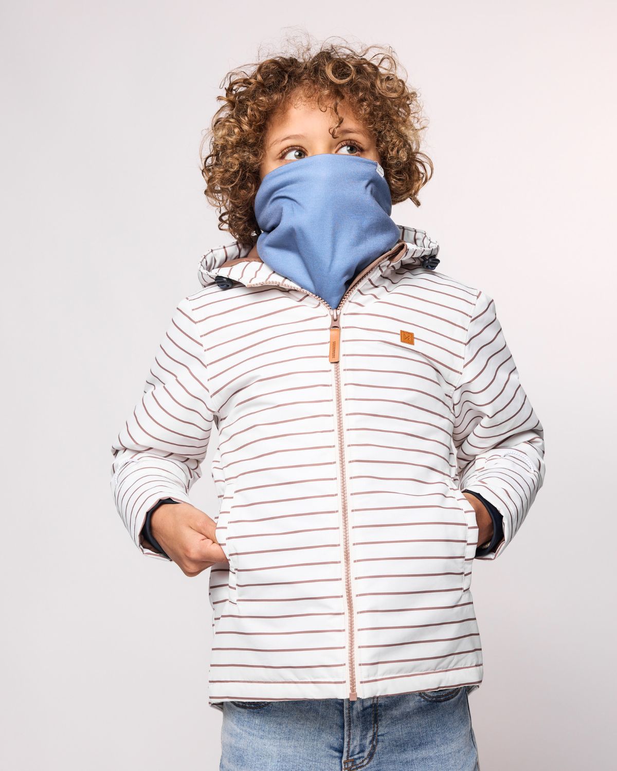 Kids and women's blue fleece neck warmer for boys and girls, made with soft, breathable fabric to keep necks warm during outdoor play, skiing, and winter snow activities