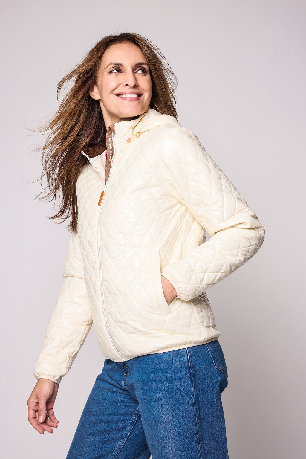  Women's shiny white puffer jacket for fall and winter with removable hood, insulated lining, and water-resistant outer shell