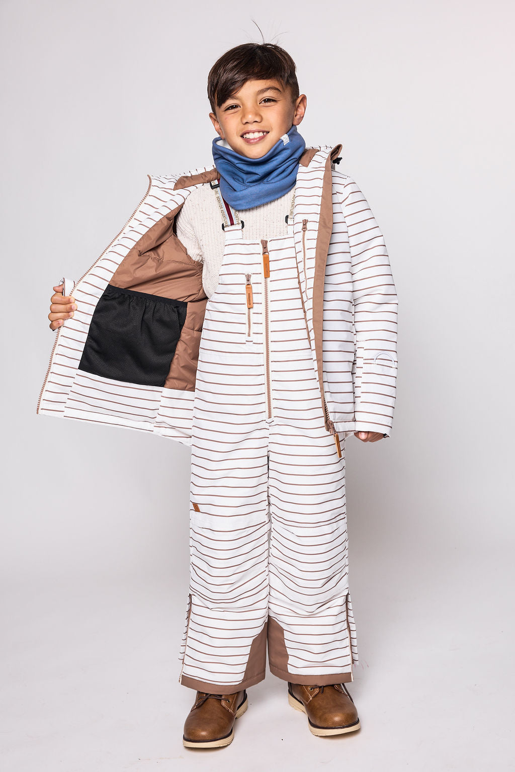 Kids striped brown and white winter coat for skiing and snow play, with warm insulation and waterproof outer shell for full cold weather protection and hood
