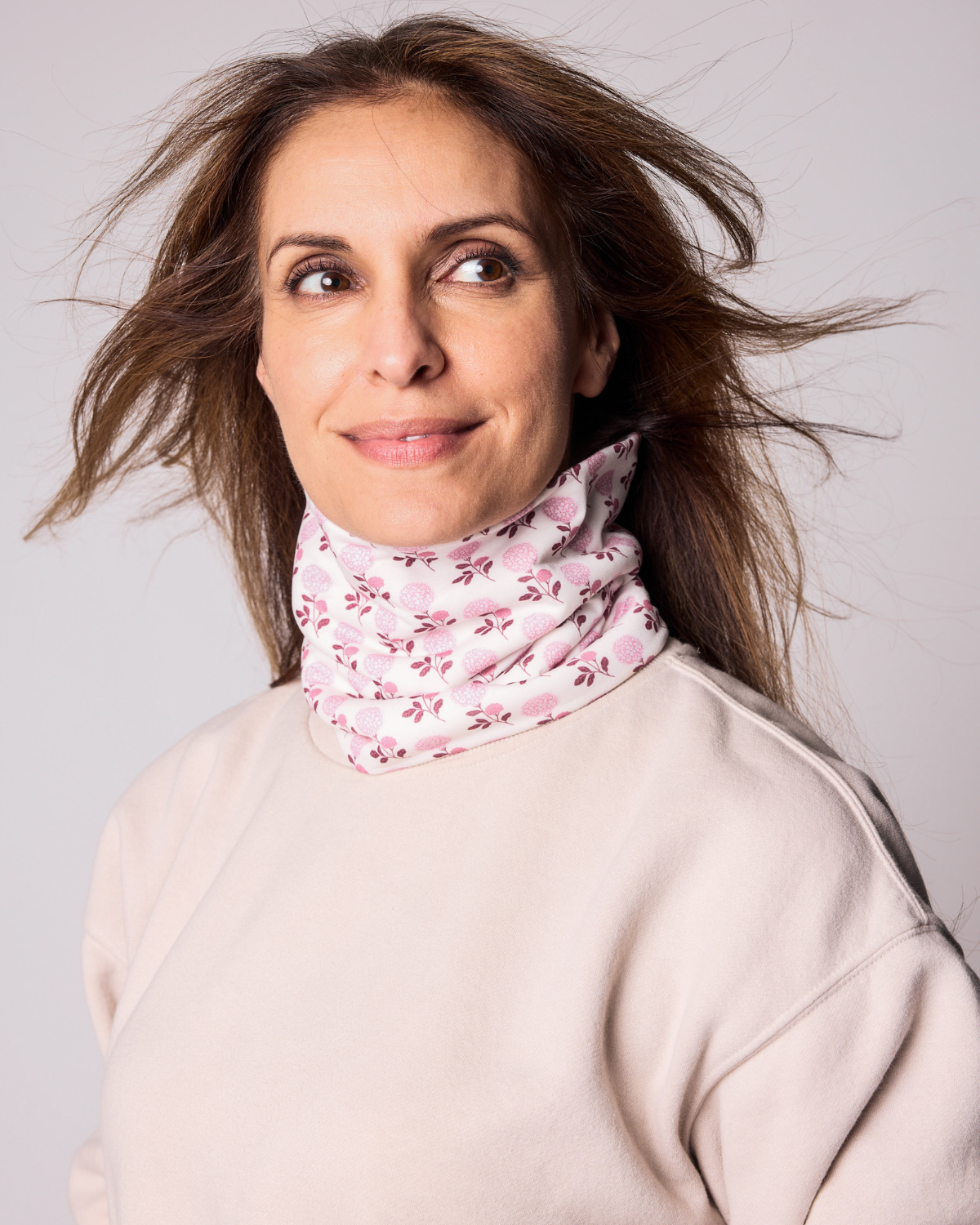 Kids and women's pink floral hydrangea fleece neck warmer for boys and girls, made with soft, breathable fabric to keep necks warm during outdoor play, skiing, and winter snow activities