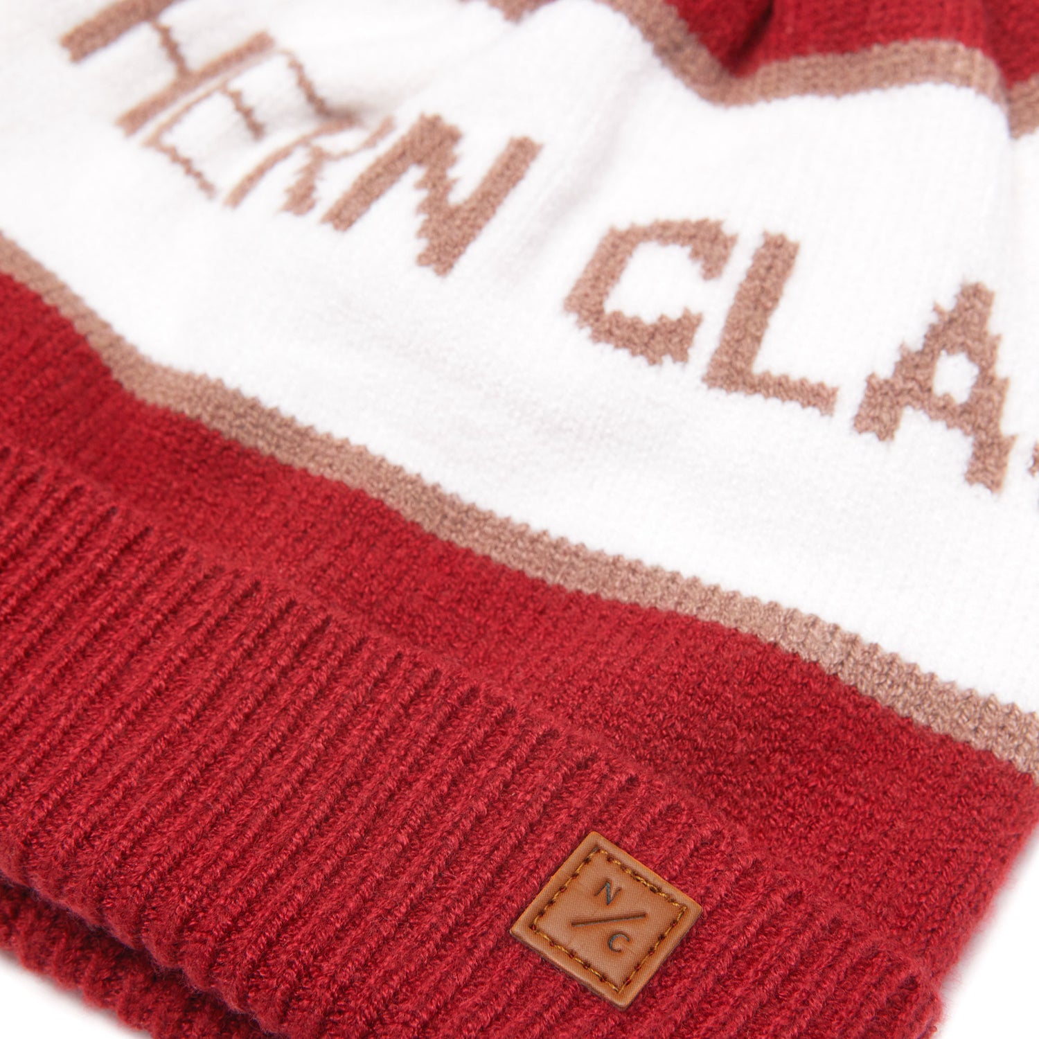 Classic Knit Pom Pom Hat for Kids and Women’s sizes in red, brown, and white, crafted with soft knit fabric, luxe faux fur pom detail, and winter-ready durability for everyday adventures. It's so soft it feels like cashmere.