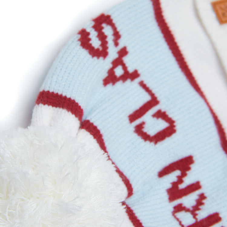 Classic Knit Pom Pom Hat for Kids and Women’s sizes in white, red, and light blue, crafted with soft knit fabric, luxe faux fur pom detail, and winter-ready durability for everyday adventures. It's so soft it feels like cashmere.