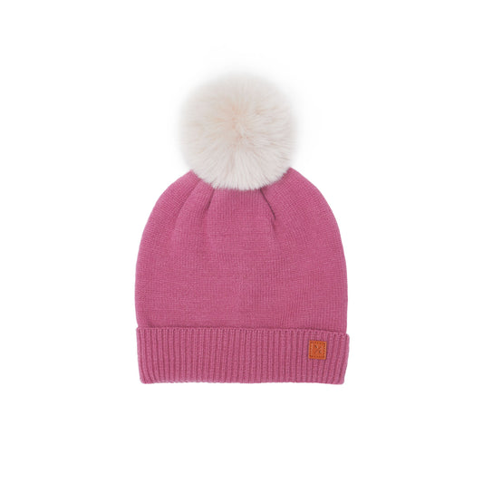 Classic Knit Pom Pom Hat for Kids and Women’s sizes in rose pink crafted with soft knit fabric, luxe faux fur pom detail, and winter-ready durability for everyday adventures. It's so soft it feels like cashmere.