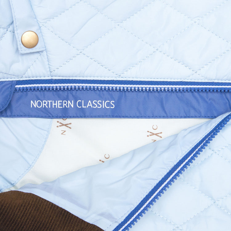 Kids and women light blue puffer jacket for fall and winter, designed as a warm in-between layer with removable hood, insulated core, and water-resistant fabric