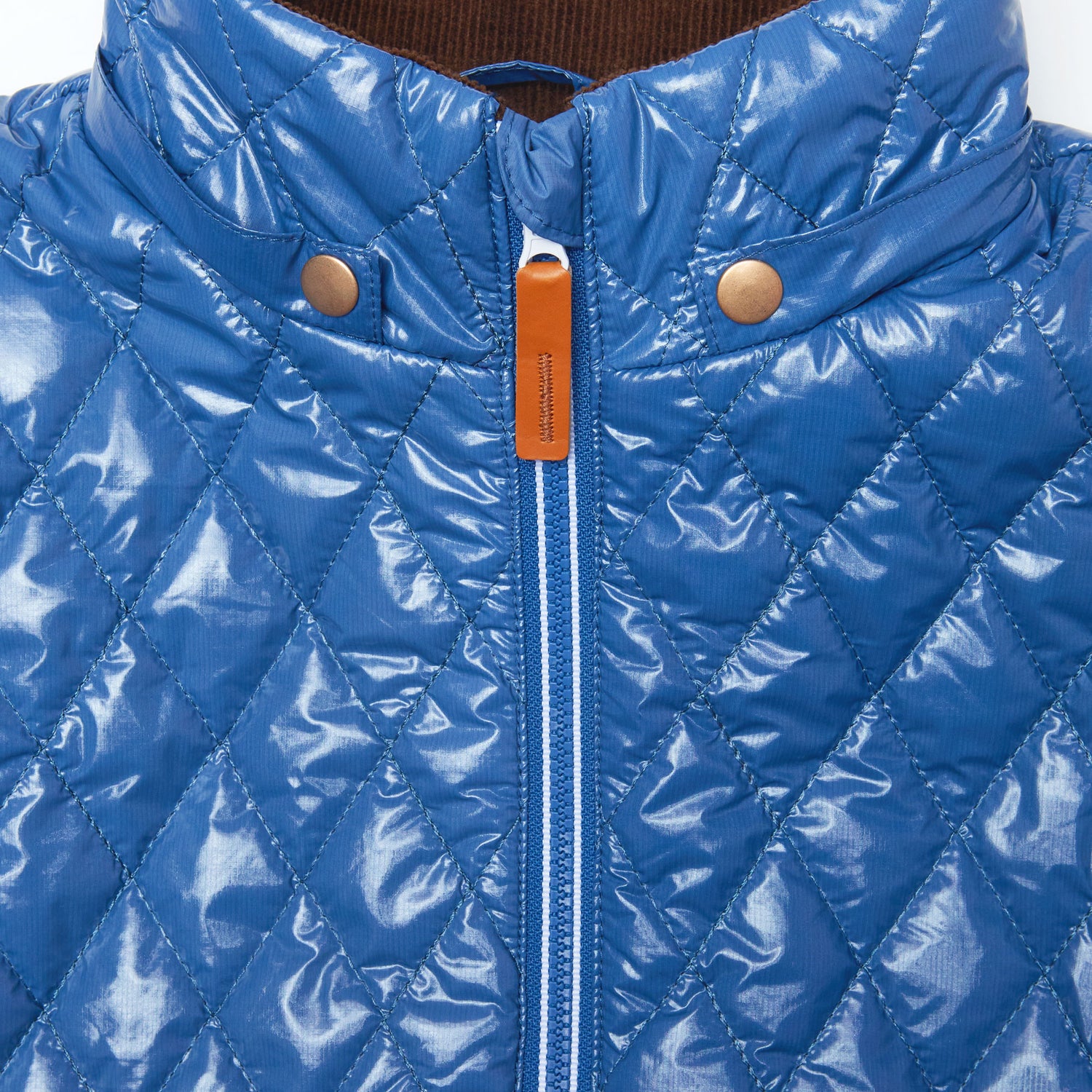 Kids and women shiny blue puffer jacket for fall and winter, designed as a warm in-between layer with removable hood, insulated core, and water-resistant fabric