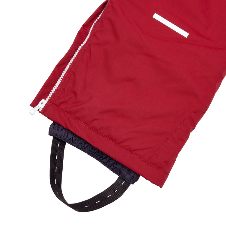 Kids red snow bib pants with adjustable straps, waterproof fabric, and reinforced knees for winter play and ski